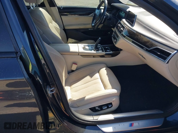 2016 BMW 7 Series 740i with VIN WBA7E2C52GG548048, listed as a IAAI auction lot 41701806 with 72,680 mi miles. Bid and sale history available at carsss.com. Image 5.
