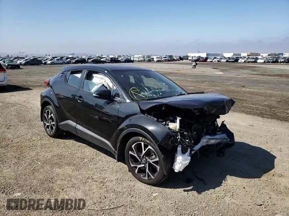2018 Toyota C-HR XLE z VIN NMTKHMBX6JR062387, wystawiony jako Copart lot #56206091 z przebiegiem 47 001 mil mil oraz Szkoda całkowita • Salvage title. Historia ofert i sprzedaży dostępna na DreamBid. Obrazek 11.