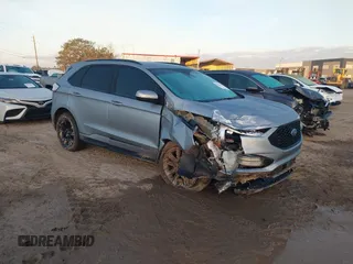 2020 Ford Edge SEL z VIN 2FMPK3J96LBB57909, wystawiony jako IAAI lot #41432078 z przebiegiem 57 114 mil mil oraz . Historia ofert i sprzedaży dostępna na DreamBid. Obrazek 1.