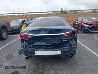 2017 Mazda 6 Sport with VIN JM1GL1U51H1156104, listed as a IAAI auction lot 41769388 with 121,405 mi miles and . Bid and sale history available at DreamBid. Image 17.