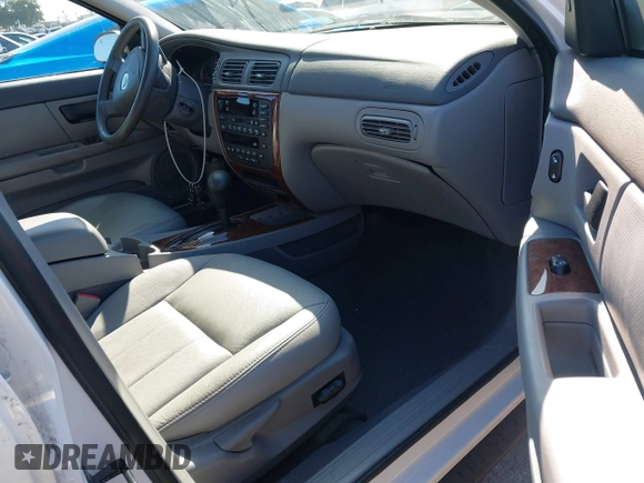 2004 Mercury Sable LS Premium z VIN 1MEHM55S64G610527, wystawiony jako IAAI lot #41739433 z przebiegiem 34 409 mil mil oraz . Historia ofert i sprzedaży dostępna na DreamBid. Obrazek 5.