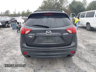 2015 Mazda CX-5 Touring with VIN JM3KE2CY4F0435563, listed as a IAAI auction lot 41311988 with 187,183 mi miles. Bid and sale history available at carsss.com. Image 16.