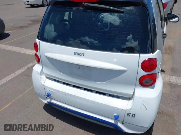 2013 Smart fortwo Pure with VIN WMEEJ3BA8DK605597, listed as a IAAI auction lot 42395754 with 55,637 mi miles and . Bid and sale history available at DreamBid. Image 6.