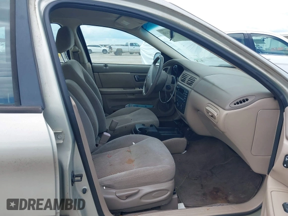 2003 Ford Taurus LX Standard z VIN 1FAFP52U43A149177, wystawiony jako IAAI lot #42227480 z przebiegiem 140 379 mil mil oraz . Historia ofert i sprzedaży dostępna na DreamBid. Obrazek 5.