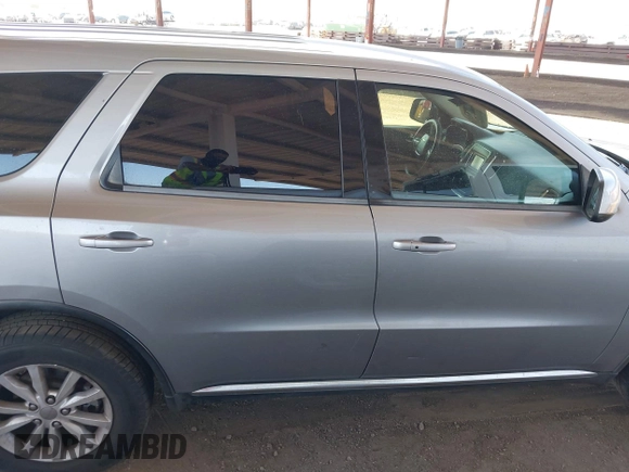 2015 Dodge Durango SXT z VIN 1C4RDJAG7FC240103, wystawiony jako IAAI lot #42621514 z przebiegiem 197 257 mil mil oraz . Historia ofert i sprzedaży dostępna na DreamBid. Obrazek 13.
