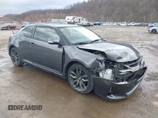 2015 Scion tC z VIN JTKJF5C7XFJ006943, wystawiony jako IAAI lot #41825515 z przebiegiem 116 035 mil mil oraz . Historia ofert i sprzedaży dostępna na DreamBid. Obrazek 1.
