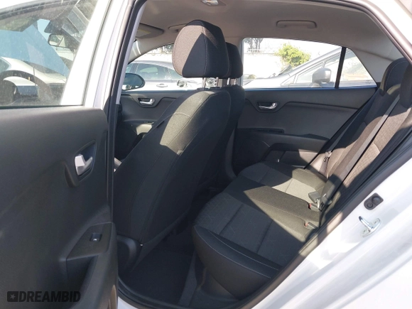 2023 Kia Rio S with VIN 3KPA24AD4PE573279, listed as a IAAI auction lot 41885298 with 11,561 mi miles. Bid and sale history available at carsss.com. Image 22.
