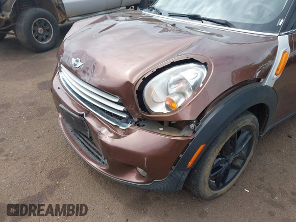 2014 MINI Countryman with VIN WMWZB3C51EWR36737, listed as a IAAI auction lot 41741248 with 69,717 mi miles and . Bid and sale history available at DreamBid. Image 12.