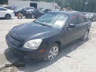 2008 Kia Optima LX z VIN KNAGE123885235142, wystawiony jako IAAI lot #42112119 z przebiegiem 145 410 mil mil oraz . Historia ofert i sprzedaży dostępna na DreamBid. Obrazek 2.
