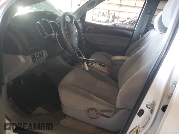 2011 Toyota Tacoma PreRunner with VIN 3TMJU4GN3BM122854, listed as a Copart auction lot 54447965 with 164,745 mi miles and Salvage Title. Bid and sale history available at DreamBid. Image 7.