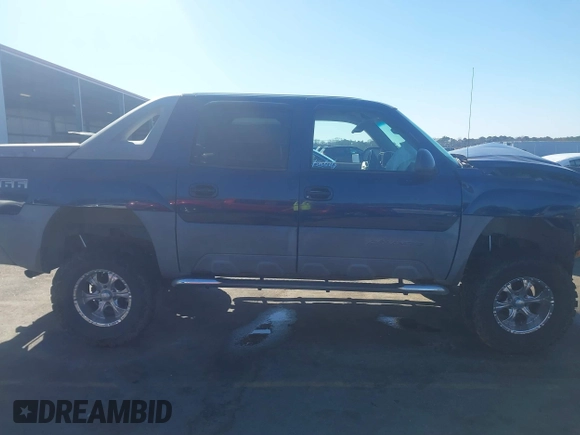 2002 Chevrolet Avalanche z VIN 3GNEC13T92G315409, wystawiony jako IAAI lot #41661553 z przebiegiem 167 410 mil mil oraz . Historia ofert i sprzedaży dostępna na DreamBid. Obrazek 13.