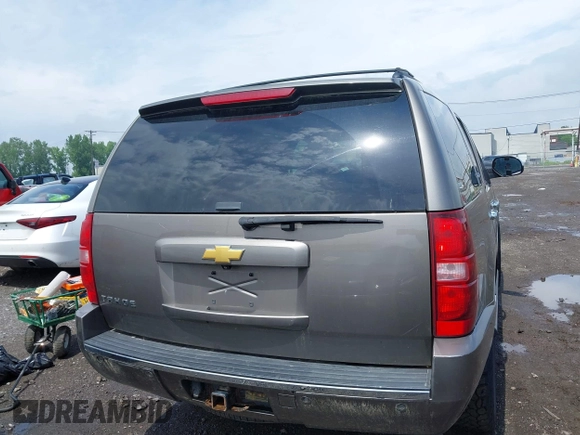 2013 Chevrolet Tahoe LTZ with VIN 1GNSKCE0XDR373858, listed as a IAAI auction lot 42456875 with 297,084 mi miles and . Bid and sale history available at DreamBid. Image 16.