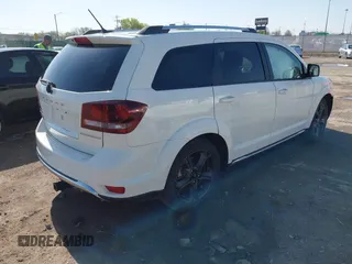 2018 Dodge Journey Crossroad z VIN 3C4PDDGG0JT386534, wystawiony jako IAAI lot #41958650 z przebiegiem 128 938 mil mil oraz . Historia ofert i sprzedaży dostępna na DreamBid. Obrazek 4.