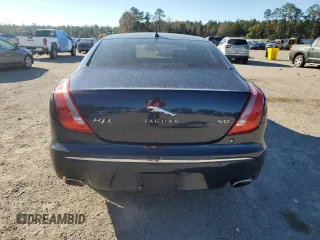 2013 Jaguar XJ with VIN SAJWA2G16DLV50973, listed as a Copart auction lot 82555074 with 148,956 mi miles and Salvage Title. Bid and sale history available at carsss.com. Image 6.