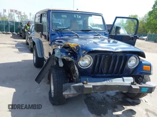 2000 Jeep Wrangler Sport with VIN 1J4FA49S5YP750123, listed as a IAAI auction lot 42060009 with Not Provided miles. Bid and sale history available at carsss.com. Image 6.