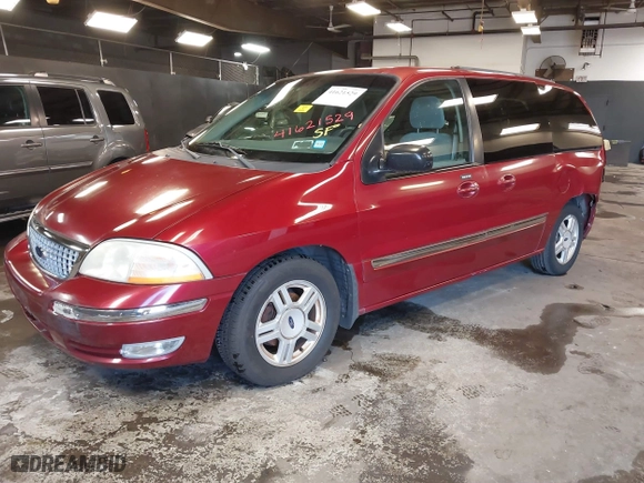 2002 Ford Windstar Wagon SE with VIN 2FMZA52442BB60882, listed as a IAAI auction lot 41621529 with 136,753 mi miles. Bid and sale history available at carsss.com. Image 2.