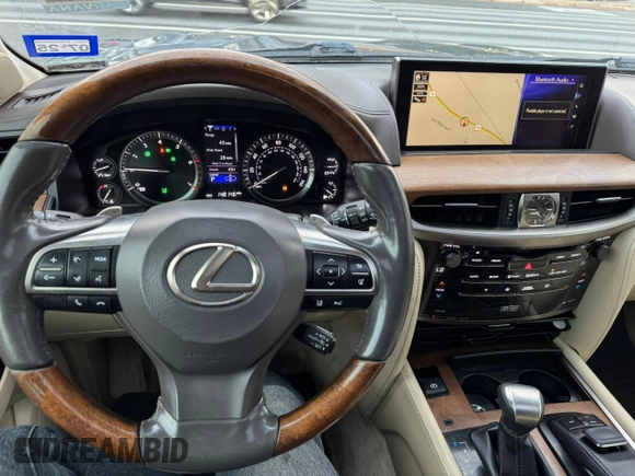 2017 Lexus LX with VIN JTJHY7AX7H4224562, listed as a Copart auction lot 82544544 with 148,146 mi miles and Clean Title. Bid and sale history available at carsss.com. Image 7.