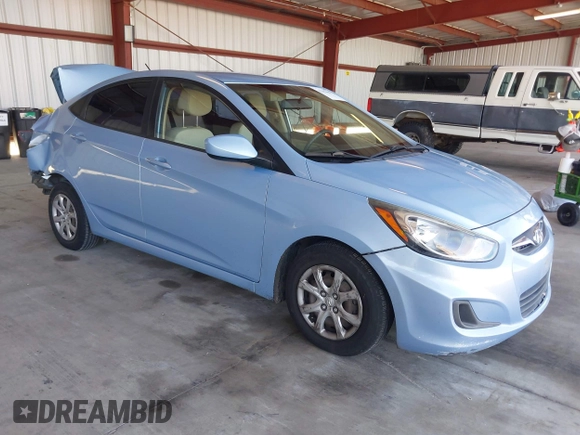 2014 Hyundai Accent GLS with VIN KMHCT4AE8EU704450, listed as a IAAI auction lot 42153043 with 139,715 mi miles. Bid and sale history available at carsss.com. Image 1.