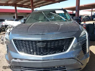 2019 Cadillac XT4 FWD Sport with VIN 1GYFZER40KF155600, listed as a IAAI auction lot 41759287 with 66,882 mi miles. Bid and sale history available at carsss.com. Image 12.
