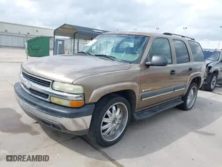 2003 Chevrolet Tahoe LS with VIN 1GNEC13V33J338251, listed as a IAAI auction lot 41634451 with 265,779 mi miles. Bid and sale history available at carsss.com. Image 2.