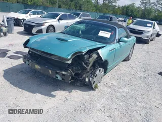 2003 Ford Thunderbird Deluxe z VIN 1FAHP60A33Y110451, wystawiony jako IAAI lot #42133863 z przebiegiem Nie podano mil oraz . Historia ofert i sprzedaży dostępna na DreamBid. Obrazek 6.