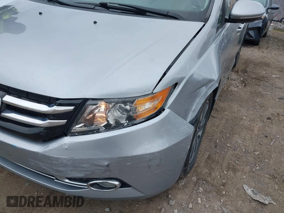 2016 Honda Odyssey Touring Elite with VIN 5FNRL5H99GB107896, listed as a IAAI auction lot 42040395 with 162,120 mi miles and . Bid and sale history available at carsss.com. Image 6.