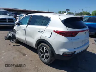 2021 Kia Sportage LX with VIN KNDPM3AC8M7932425, listed as a IAAI auction lot 39067549 with 56,841 mi miles. Bid and sale history available at carsss.com. Image 3.