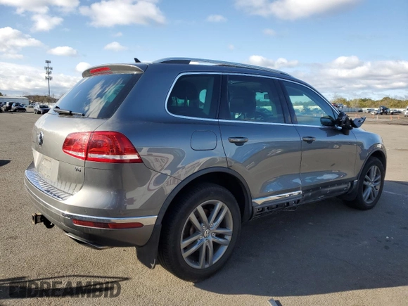 2015 Volkswagen Touareg Sport with VIN WVGEF9BP9FD007657, listed as a Copart auction lot 49432045 with 61,668 mi miles and Salvage title. Bid and sale history available at DreamBid. Image 3.