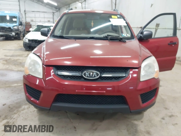 2009 Kia Sportage LX with VIN KNDJE723497555026, listed as a IAAI auction lot 42102679 with 136,398 mi miles. Bid and sale history available at carsss.com. Image 6.