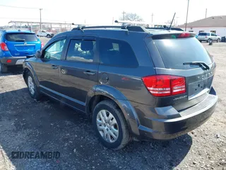 2018 Dodge Journey SE with VIN 3C4PDCAB3JT506088, listed as a IAAI auction lot 41969875 with 47,567 mi miles and . Bid and sale history available at carsss.com. Image 3.