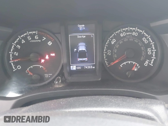 2018 Toyota Tacoma SR with VIN 3TMCZ5AN4JM130307, listed as a IAAI auction lot 41541477 with 74,369 mi miles and . Bid and sale history available at DreamBid. Image 7.