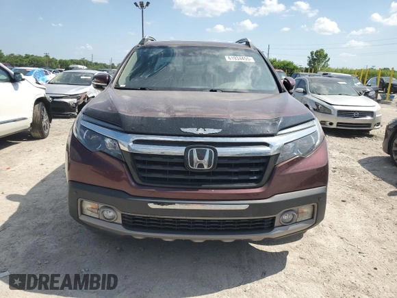 2019 Honda Ridgeline RTL-E with VIN 5FPYK3F71KB002046, listed as a Copart auction lot 61934455 with 131,674 mi miles and Salvage title. Bid and sale history available at DreamBid. Image 5.