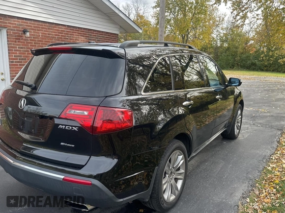 2013 Acura MDX Advance with VIN 2HNYD2H87DH516980, listed as a Copart auction lot 79098324 with 176,374 mi miles and Clean Title. Bid and sale history available at DreamBid. Image 4.