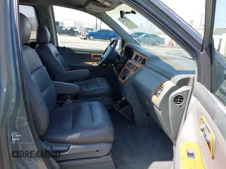 2001 Honda Odyssey EX z VIN 2HKRL18641H504729, wystawiony jako IAAI lot #42337944 z przebiegiem 203 356 mil mil oraz . Historia ofert i sprzedaży dostępna na DreamBid. Obrazek 5.