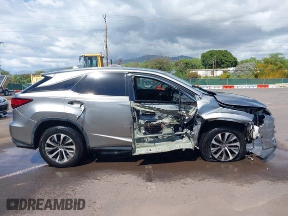 2020 Lexus RX with VIN 2T2HZMAA9LC163081, listed as a IAAI auction lot 41627232 with 38,153 mi miles. Bid and sale history available at carsss.com. Image 14.