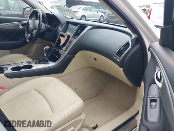 2014 Infiniti Q50 Premium with VIN JN1BV7AP3EM674807, listed as a IAAI auction lot 42003949 with 138,454 mi miles. Bid and sale history available at carsss.com. Image 5.