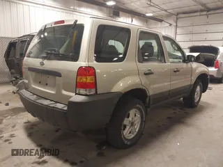 2005 Ford Escape XLS Value with VIN 1FMYU02Z35KA57707, listed as a IAAI auction lot 41759027 with 1 mi miles. Bid and sale history available at carsss.com. Image 4.