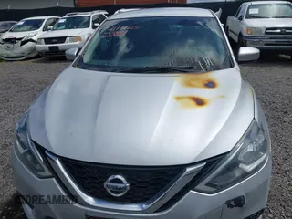 2019 Nissan Sentra S z VIN 3N1AB7AP0KY310003, wystawiony jako IAAI lot #41778223 z przebiegiem Nie podano mil oraz . Historia ofert i sprzedaży dostępna na DreamBid. Obrazek 13.
