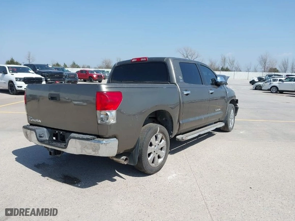 2008 Toyota Tundra 2WD Truck with VIN 5TFEV541X8X042976, listed as a IAAI auction lot 38569607 with 202,791 mi miles. Bid and sale history available at carsss.com. Image 4.