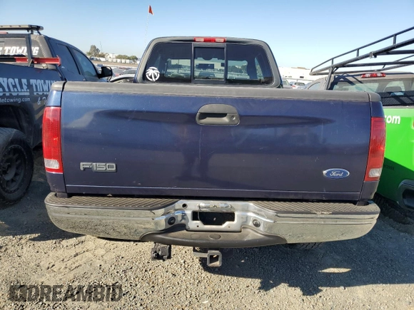 2003 Ford F-150 XL with VIN 1FTRX17L13NA95202, listed as a Copart auction lot 87766385 with 124,961 mi miles and Salvage Title. Bid and sale history available at carsss.com. Image 6.