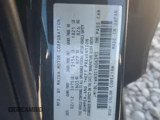 2012 Mazda 3 i Grand Touring with VIN JM1BL1W83C1606393, listed as a Copart auction lot 47127975 with Not Provided miles and Salvage Title. Bid and sale history available at DreamBid. Image 13.