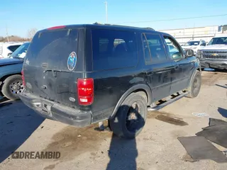 1999 Ford Expedition XLT z VIN 1FMRU1760XLB99695, wystawiony jako IAAI lot #41396676 z przebiegiem 214 434 mil mil oraz . Historia ofert i sprzedaży dostępna na DreamBid. Obrazek 4.