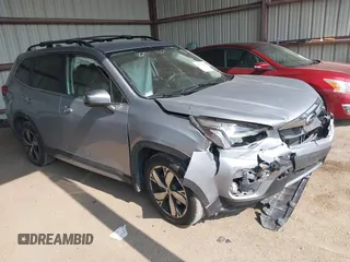 2021 Subaru Forester Touring with VIN JF2SKAXC8MH509805, listed as a IAAI auction lot 42377467 with 52,960 mi miles and . Bid and sale history available at DreamBid. Image 1.