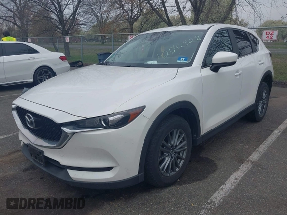 2017 Mazda CX-5 Touring with VIN JM3KFACL5H0189296, listed as a IAAI auction lot 42042328 with 60,208 mi miles and . Bid and sale history available at carsss.com. Image 17.