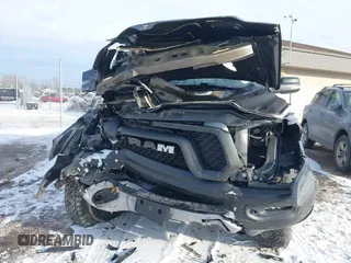 2022 Ram 1500 Rebel z VIN 1C6SRFLT9NN204868, wystawiony jako IAAI lot #41351273 z przebiegiem 67 120 mil mil oraz . Historia ofert i sprzedaży dostępna na DreamBid. Obrazek 12.