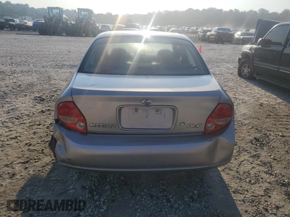 2001 Nissan Maxima GXE z VIN JN1CA31D11T828767, wystawiony jako Copart lot #69504024 z przebiegiem 177 431 mil mil oraz Szkoda całkowita • Salvage title. Historia ofert i sprzedaży dostępna na DreamBid. Obrazek 6.
