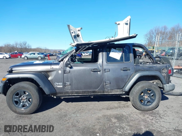 2019 Jeep Wrangler Unlimited Sport S with VIN 1C4HJXDG7KW572294, listed as a IAAI auction lot 41607986 with 61,734 mi miles and . Bid and sale history available at DreamBid. Image 14.