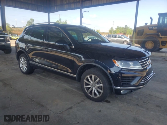2017 Volkswagen Touareg Sport with VIN WVGEF7BP8HD000237, listed as a Copart auction lot 52714074 with 107,463 mi miles and . Bid and sale history available at DreamBid. Image 4.