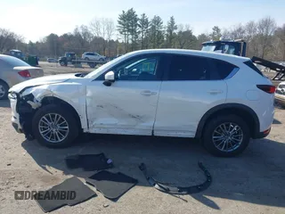 2017 Mazda CX-5 Touring z VIN JM3KFBCL8H0214052, wystawiony jako IAAI lot #41940783 z przebiegiem 120 083 mil mil oraz . Historia ofert i sprzedaży dostępna na DreamBid. Obrazek 13.