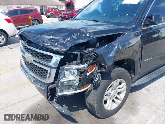 2019 Chevrolet Tahoe LT z VIN 1GNSKBKC1KR200476, wystawiony jako IAAI lot #41897702 z przebiegiem 136 432 mil mil oraz . Historia ofert i sprzedaży dostępna na DreamBid. Obrazek 6.